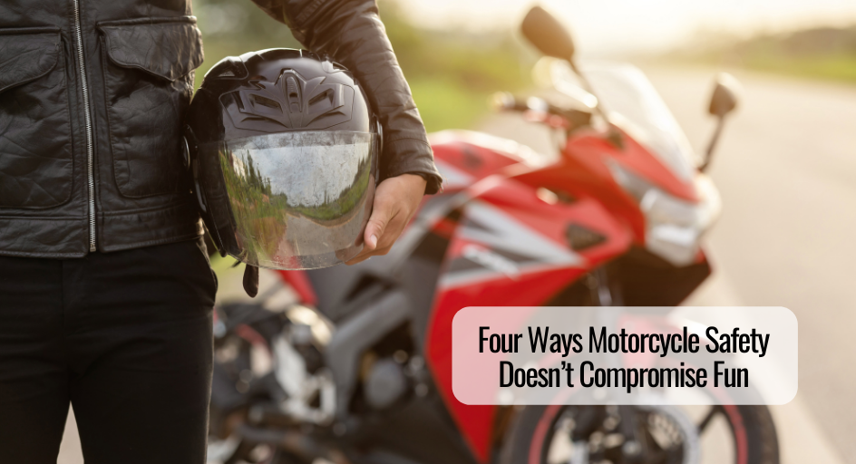 image of motorcycle rider holding helmet